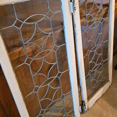 Pair of old leaded glass windows.
