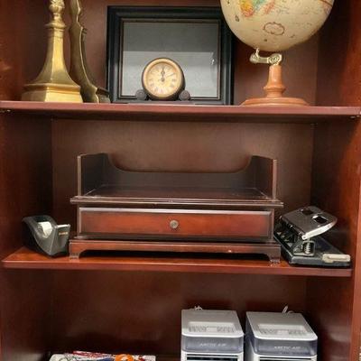 Office lot with assorted supplies decor, and electronic fans
