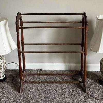 Pair of floral porcelain table lamps with wooden quilt rack