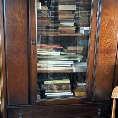 China cabinet and books