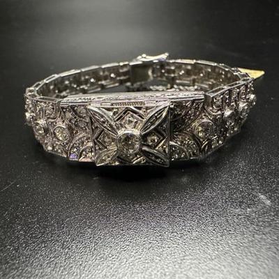 Platinum watch with diamonds, Includes additional watch band to enlarge