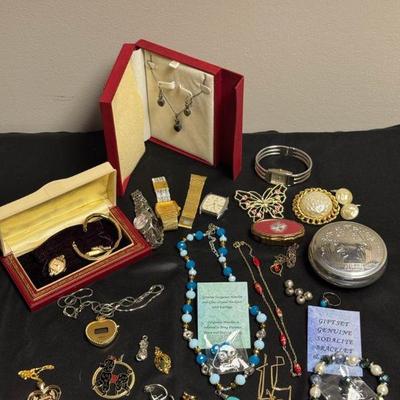 Costume jewelry with mix of watches