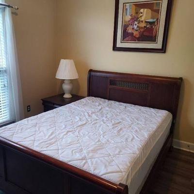 Queen sleigh bed with art bedding