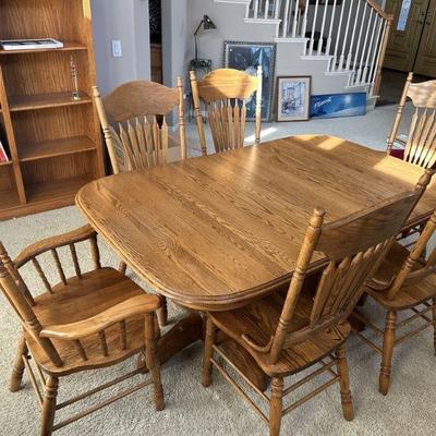 Solid oak dining table and 6 chairs