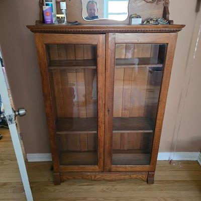 Oak antique double door cabinet