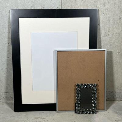 (3pc) Picture Frames | Including a black frame with mat (insert 13.5 x 10.5 in.), a jeweled easel-back frame of small size, and a simple...