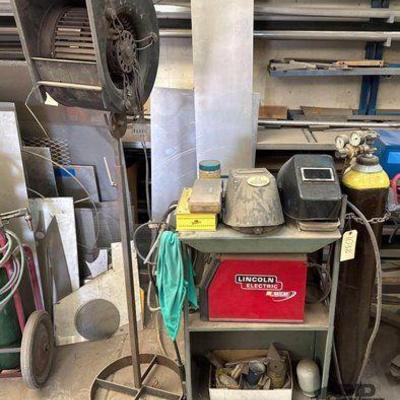 #1038 • Lincoln Electric Welder, Welding Cart with CO2 Tank, Shop Fan with Adjustable Stand, Welding Masks
