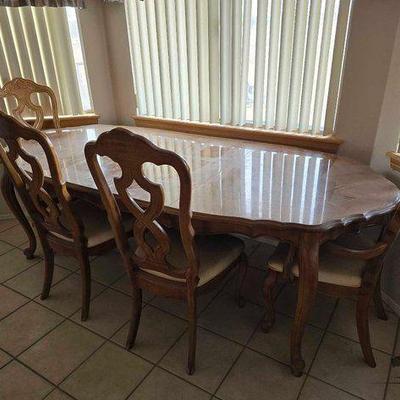 Sale Photo Thumbnail #117: #2500 • Wooden Table with 4 Chairs and 2 Leafs
