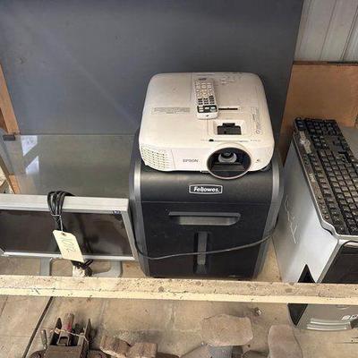 #1012 • Dell Desktop Computer with Keyboard, Samsung Monitor, Epson Projector, and Fellowes Paper Shredder
