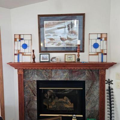 The homeowners have decided to remove the two stained glass pieces. They will not be available for sale. 