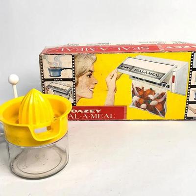 Lot #67 Vintage Seal A Meal, Juicer, and Cookbook Holder
