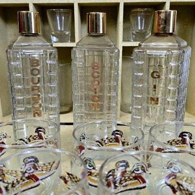 Lot #5  Waffle Decanters and Libbey Duck Drake & Hen glasses