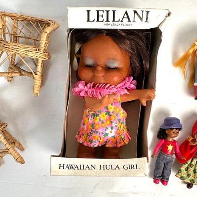 Lot #54 Vintage Leilani Hawaiian Doll, Assorted Madame Alexander Mini Dolls, and Two Doll Furniture Chairs
