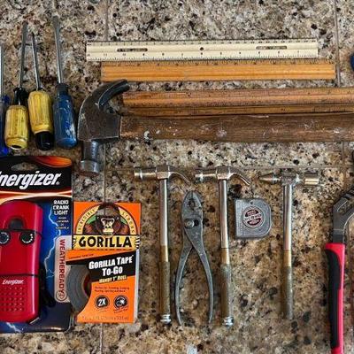 Hand Tool Lot - Energizer Flashlight, Vintage Rulers, Tape Measure, Hammers, Pliers, And More