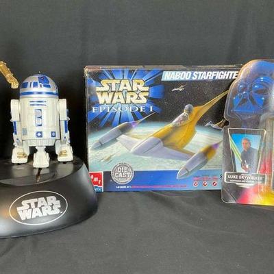 Star wars collectibles lot figures, starfighter, and more