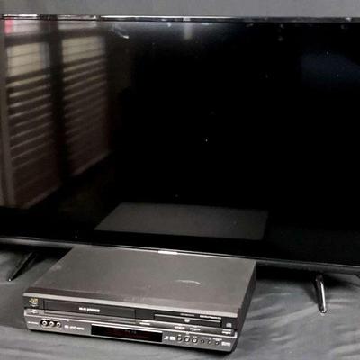 Flat screen tv and jvc dvd vhs combo player