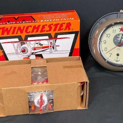 Winchester biplane model and soviet navy ship clock