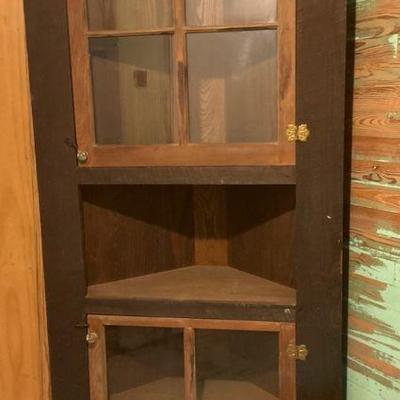 Rustic wooden corner cabinet with glass doors