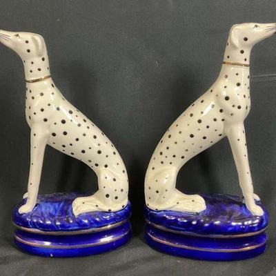 A pair of porcelain dalmatian figurines