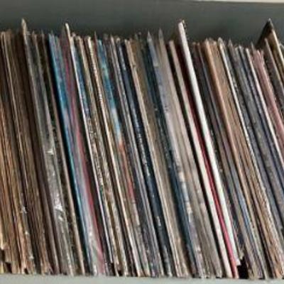 Large vinyl record collection mixed genres artists
