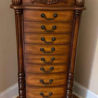 Elegant carved wood jewelry armoire
