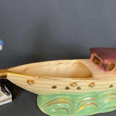 Hand painted ceramic boat colonial figurine