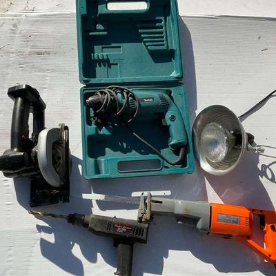 Power tool lot drills saws, and work light