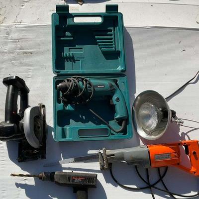 Two drills reciprocating saw skill saw without battery pack shop light