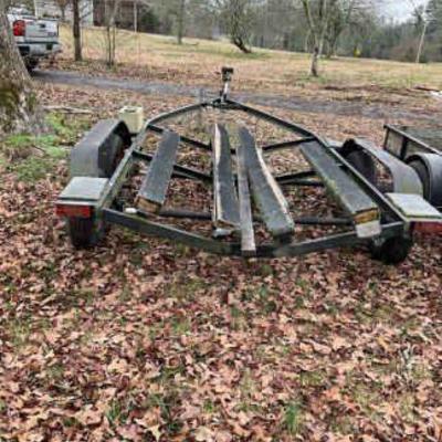 Boat trailer with dual axle frame