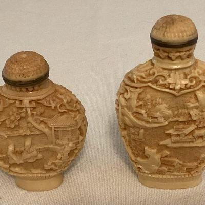 MMM125 Two Carved Ivory Colored Snuff Bottles