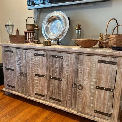 Pottery Barn, Reclaimed Wood Four Door Cabinet/Console . Measures 71” long x 18” deep  x 35 1/2” tall. Offered at $750. 