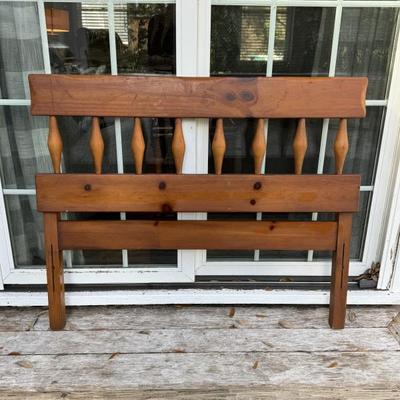 Midcentury Pine twin bed headboard and footboard with rocket shaped spindles and flared legs. The headboard measures 41 3/4inches wide...