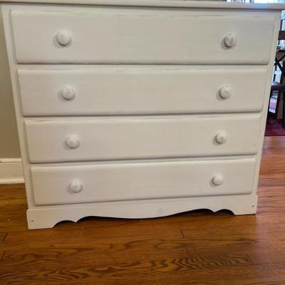 Vintage white four drawer chest . Measures 40” long x 16” deep x 34 1/2” tall. Offered at $125.
