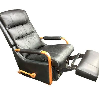KEKU612 La-Z-Boy Black Leather Manual Recliner	Style appears to be the Dreamtime rocker recliner. Some wear visible on leather. 
