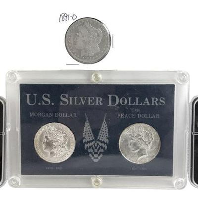TN164 2 Ungraded, 1 Raw, 2 Slabbed Silver Dollars
