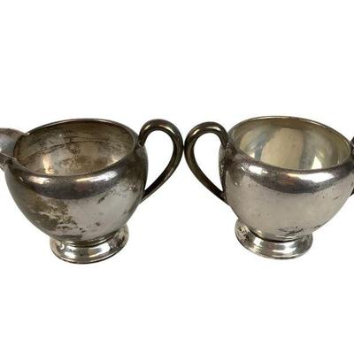 KEKU601 Fisher Sterling Creamer And Sugar Dish	Engraved fisher sterling 785 on both dishes
