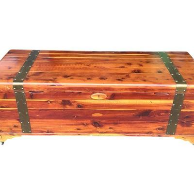 ANMC614 Large Cedar Chest With Brass Banding	This chest has a key, some cedar shavings in bag for smell and some wooden pieces on with...