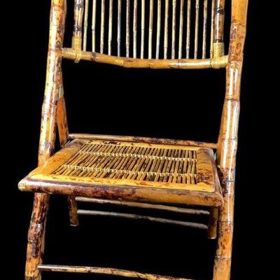 KEKU301 Bamboo Folding Chair	Nice bamboo folding chair, has a glossy finish. 
