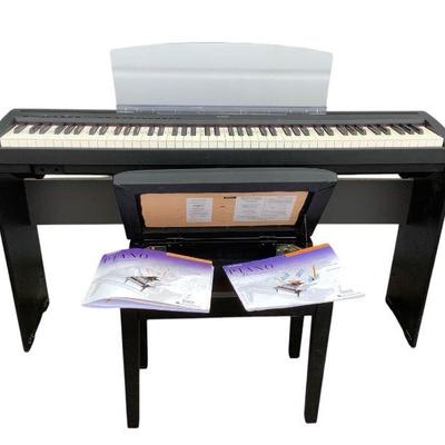 ANMC631 Yamaha Digital Piano And Stand	Tested and works. Model# P-95B. Cord not included.
