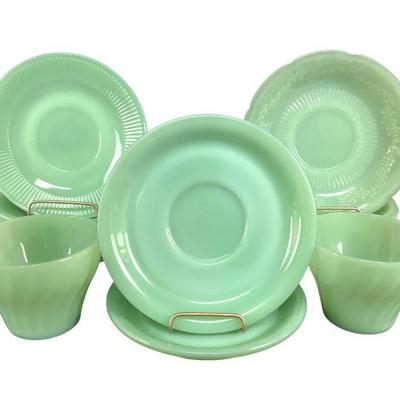 TN111 Box Of Jadeite Plates/ Cups Etc	This lot appears to have Ann assortment of  "Jane ray" ribbed pattern judeite saucers,...