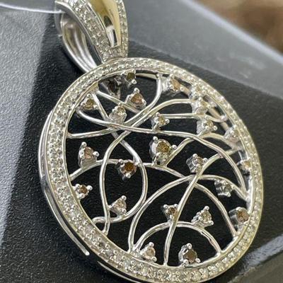 TN241 10k White Gold & Diamond With 23 Champagne Diamonds, Pendant	23 prong set champagne diamonds surrounded by 95 bead set diamonds. 
