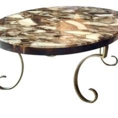 Vintage Aragonite Coffee Table

Elegant design with Hollywood regency style metal scrolled legs paired with a stunning table top...