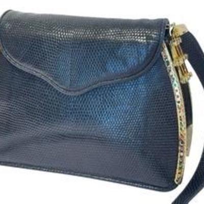 Vintage Judith Leiber Handbag Snakeskin Expandable with Bejeweled Trim 

In very good condition and measures about 8" w x 6.25" h 