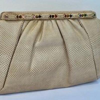 Judith Leiber Karung Snakeskin Beige Handbag with Gemstones 

Beautiful design! Use as a clutch or handbag. 

Measures about 9.5" x...