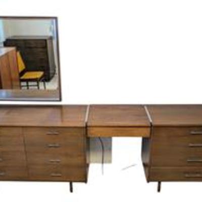 Paul McCobb for Calvin Linear 3pc Dresser with Vanity Mirror.

Unknown if the wall mirror matches but looks nice with the set. There are...