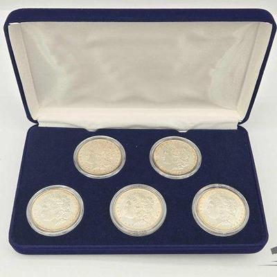 #1502 • (5) 1881-1885 Morgan Silver Dollars
