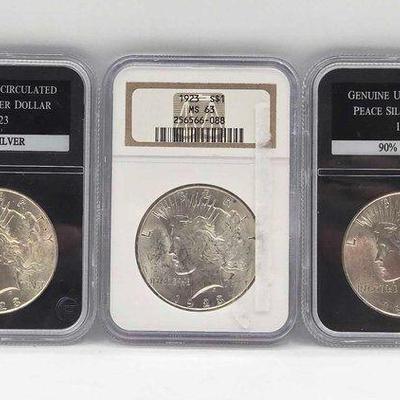 #1688 • (3) 1922-1923 Morgan Silver Dollars
