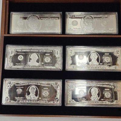 #2056 • 6 Quater Pound silver dollars. 999 with COA
