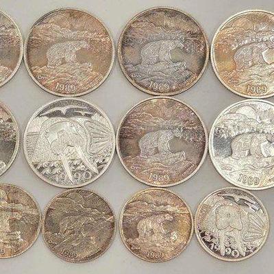 #2116 • (12) Alaska Commerative Coins
