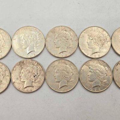#1806 • (10) 1928 Silver Peace Dollars
